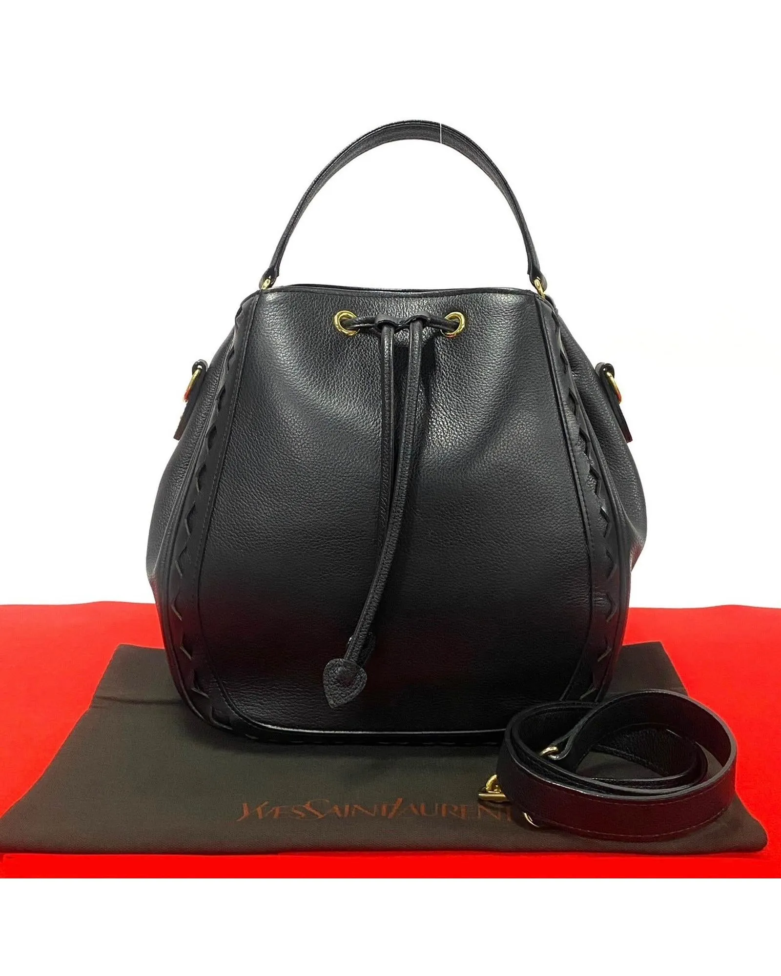 Authentic YSL Leather Drawstring Crossbody Bag in Excellent Condition